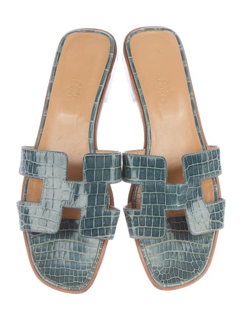 hermes metallic oran sandals|Hermes oran crocodile sandals.